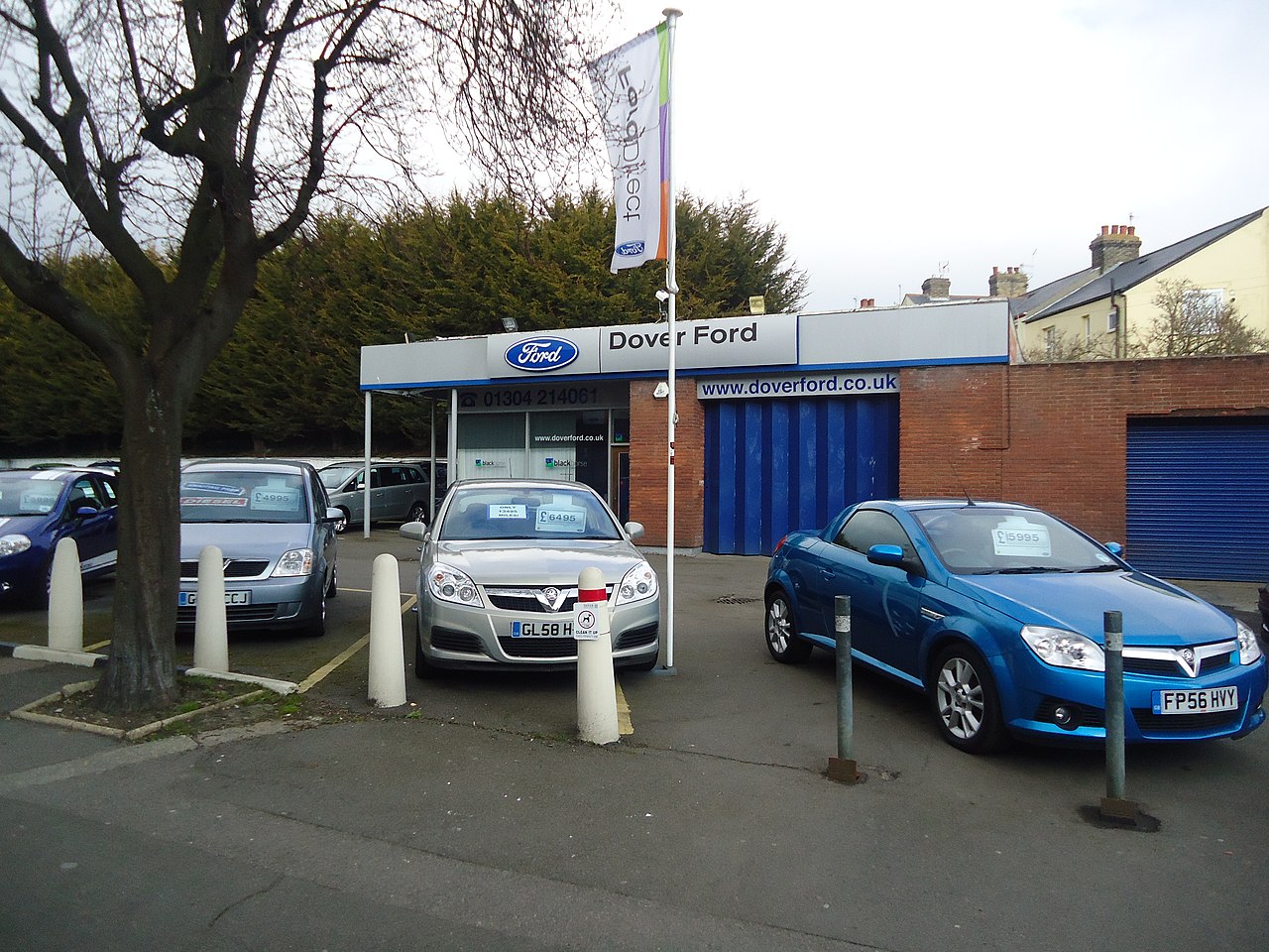 A used car sales lot with vehicles on display